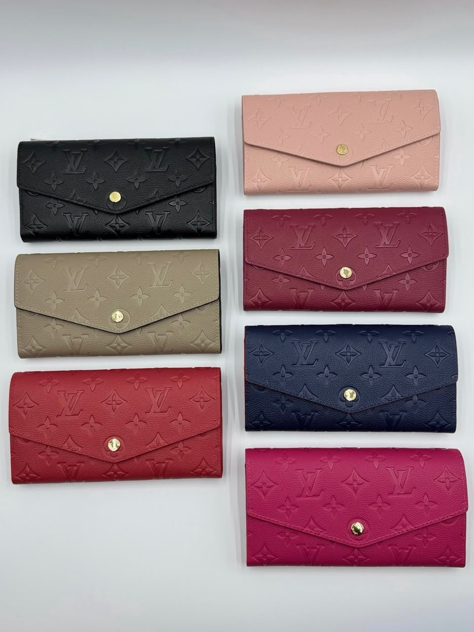 Louis Vuitton Sarah Wallet in Monogram Empreinte leather